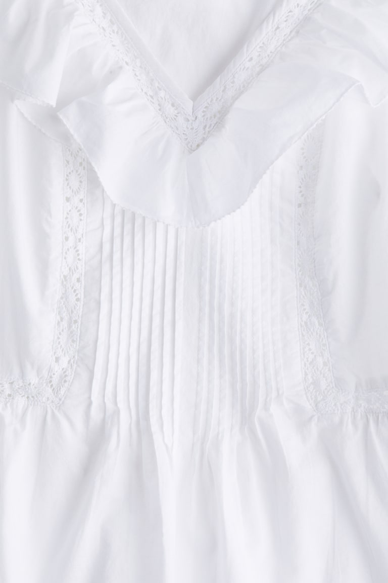 H&M Baumwolltop mit Volant Flash Sale
