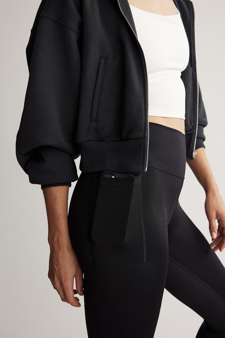 H&M Sportleggings mit DryMove™ und Beintaschen Saisonschlussverkauf