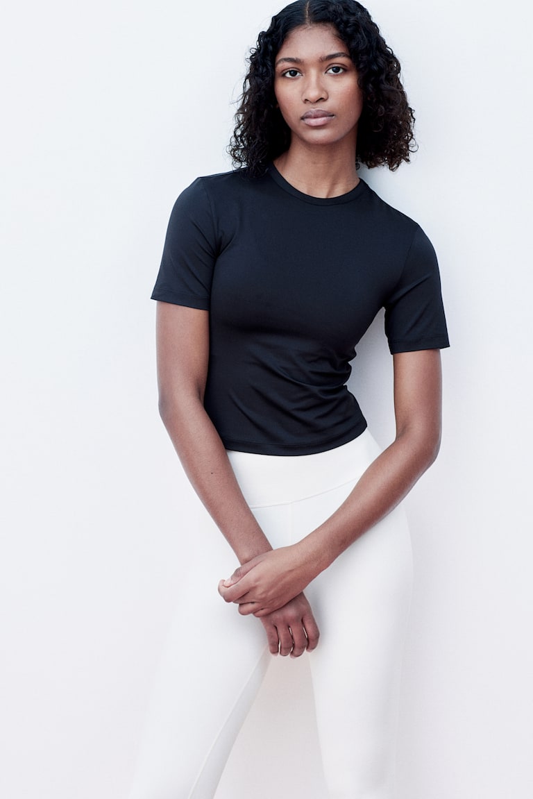 H&M Cropped Sportshirt mit DryMove™ Riesige Rabatte