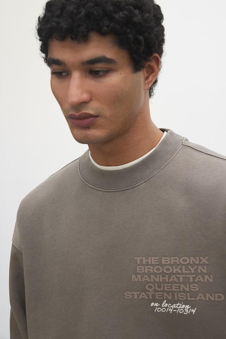 H&M Bedrucktes Sweatshirt in Loose Fit Wochenangebot