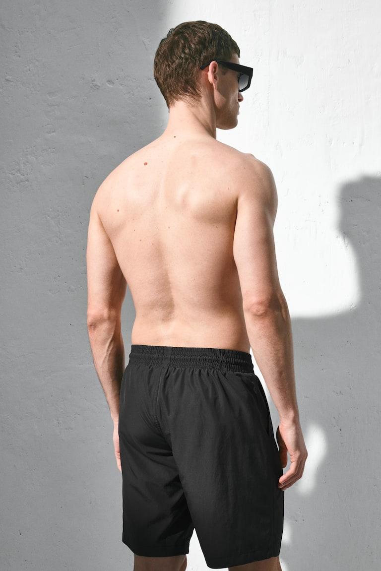 H&M Knielange Badeshorts Kostenlose Rückgabe