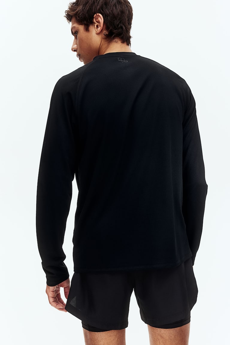 H&M Doppellagige Sportshorts mit DryMove™ Exklusivangebot