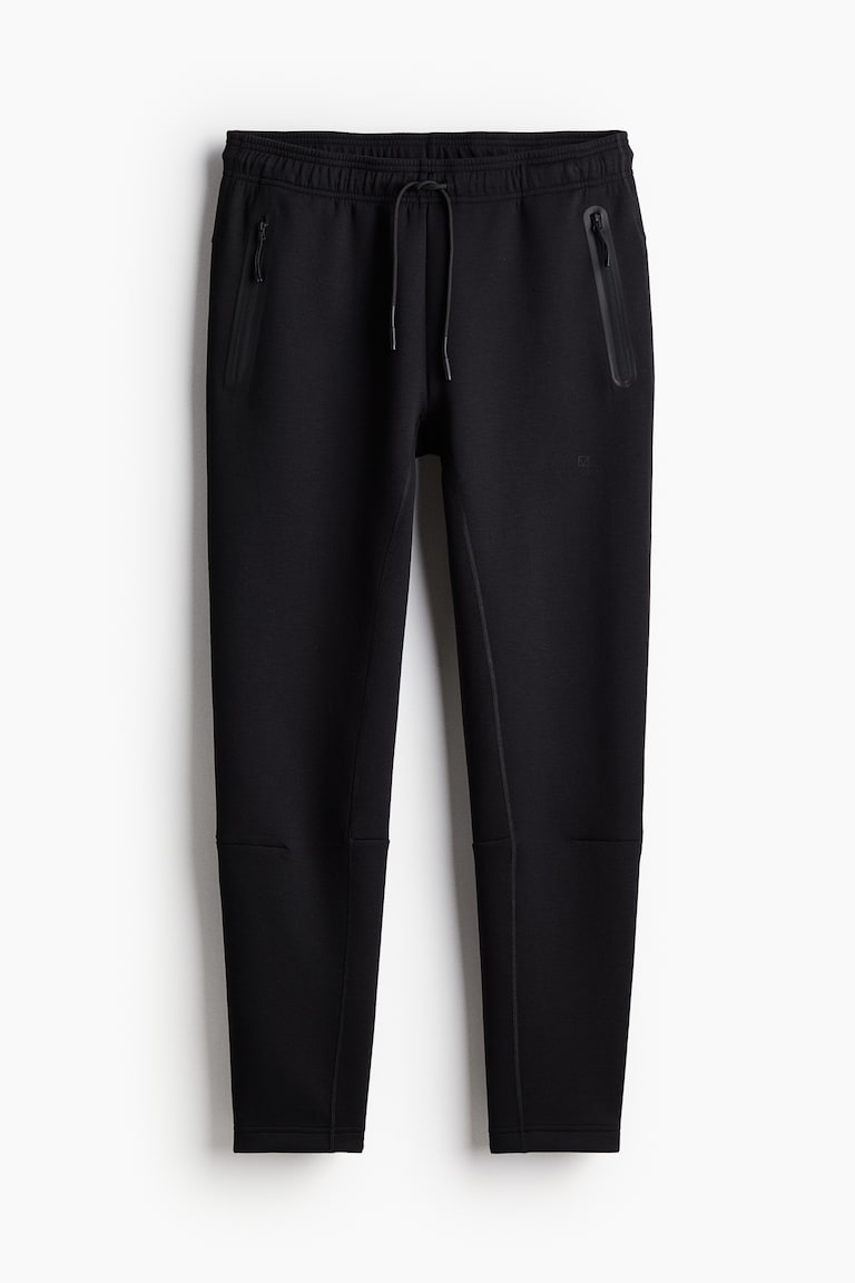 H&M Sport-Joggpants mit DryMove™ in Slim Fit Jubiläumsangebot