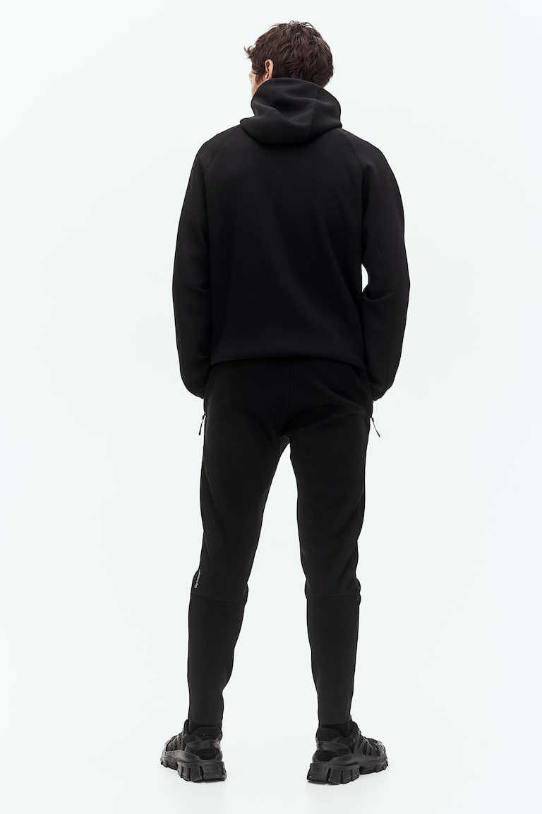 H&M Sport-Joggpants mit DryMove™ in Slim Fit Lagerräumung