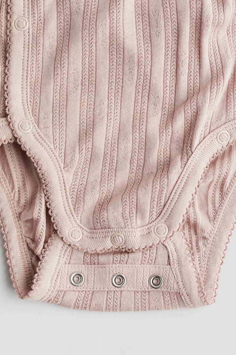 H&M Jerseybody mit Pointellemuster Rabatt