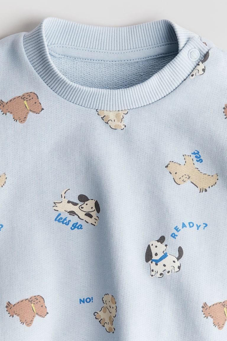 H&M Sweatshirt mit Print Sonderangebot der Fabrik