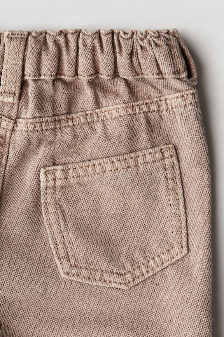 H&M Jeans mit Stickereien Riesige Rabatte