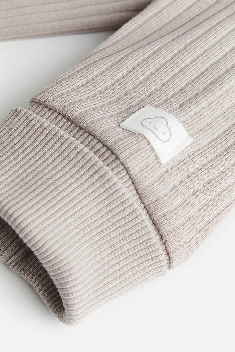 H&M Mitwachsender Strampler Fabrik Onlineshop