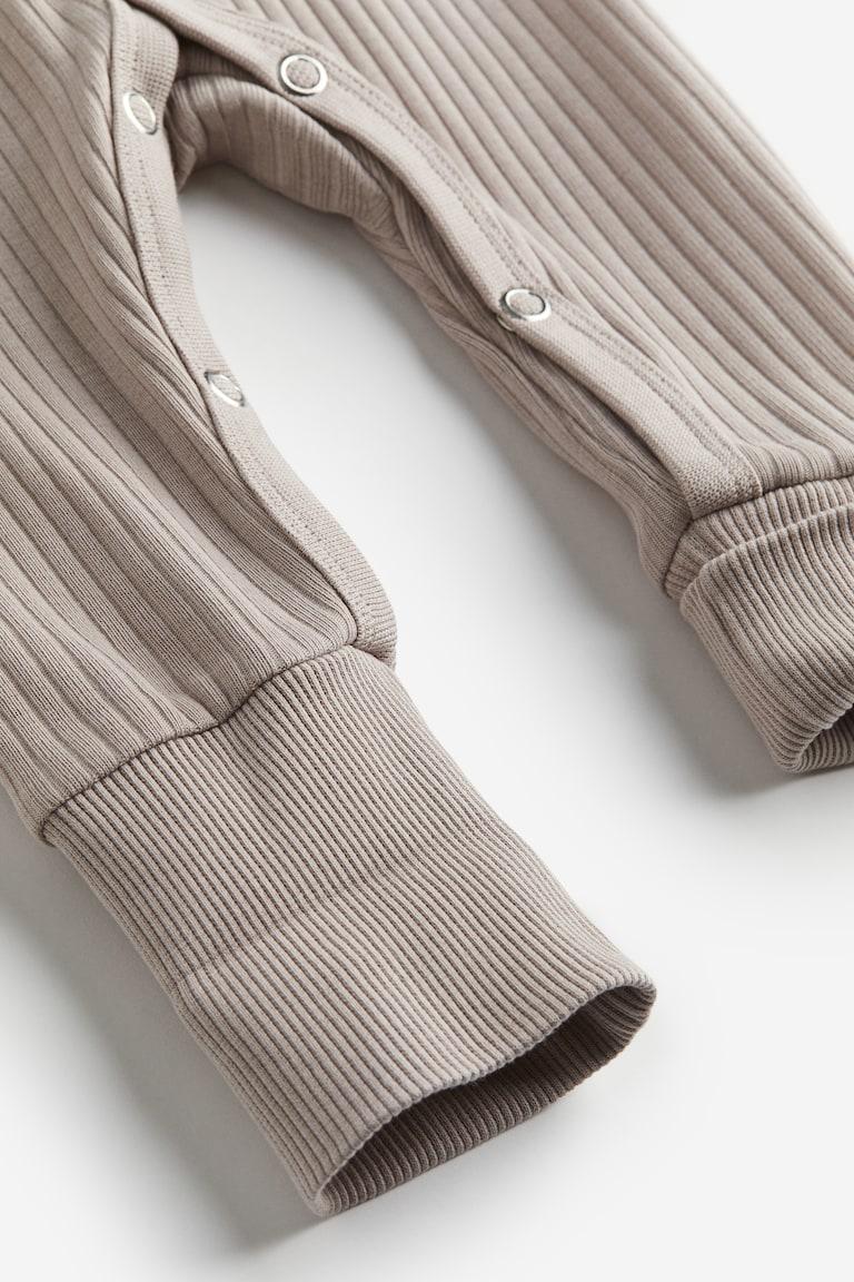 H&M Mitwachsender Strampler Fabrik Onlineshop