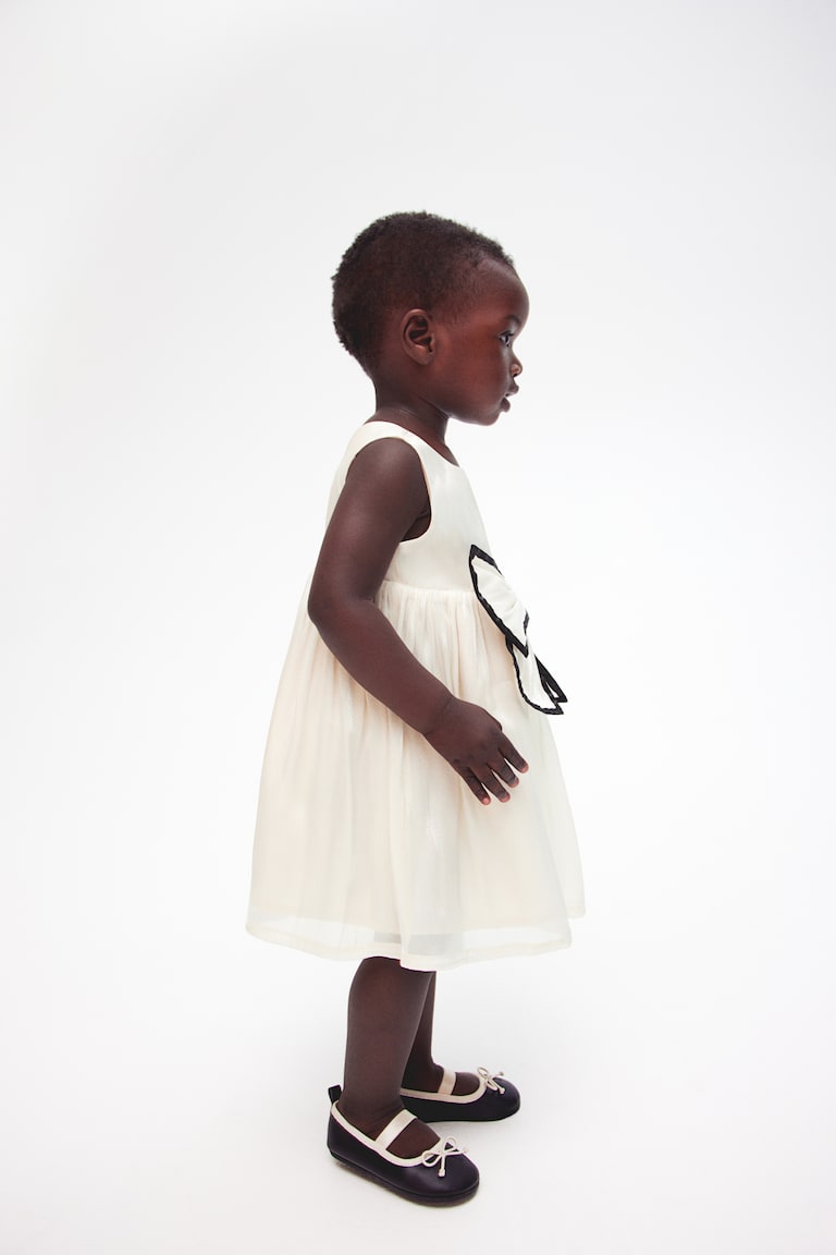 H&M Organza-Kleid mit Schleifendetail Zeitbegrenzte Promotion