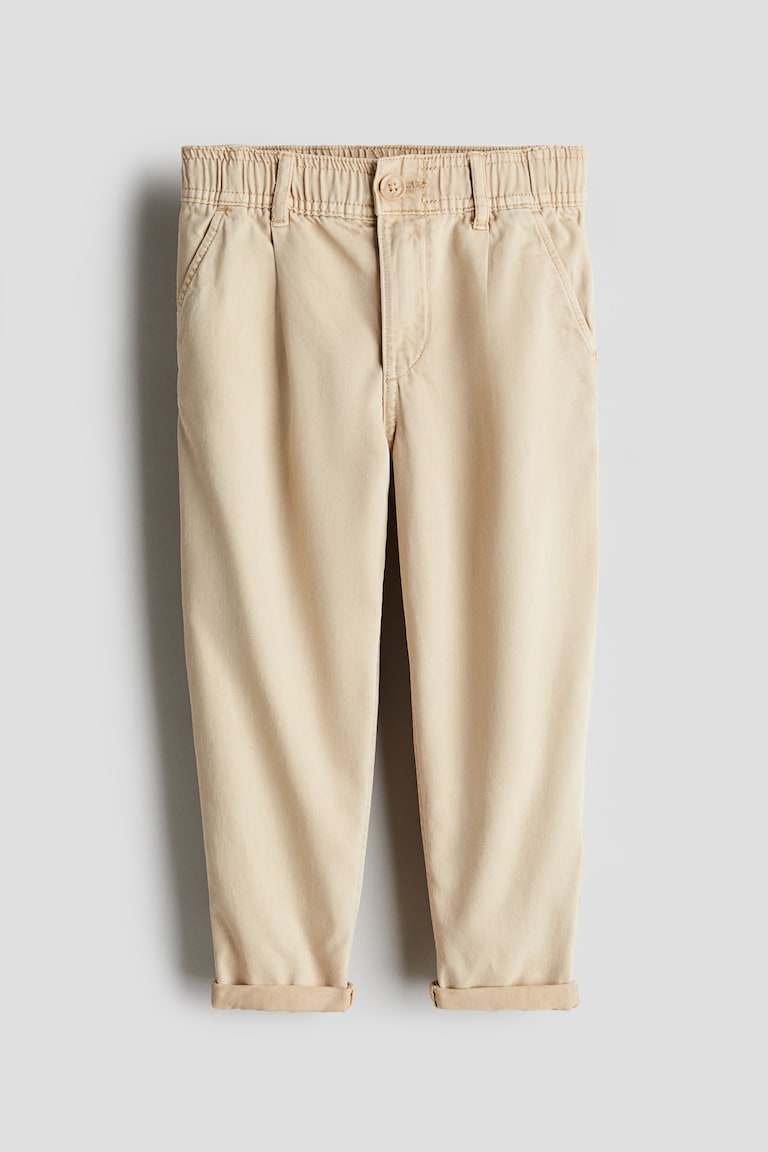 H&M Loose-fit tapered twill chinos Limitierter Zeitrabatt