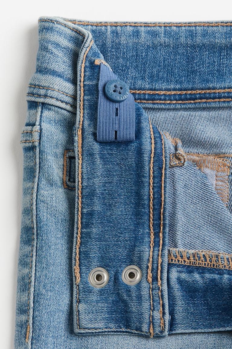 H&M Superstretch Flared Leg Jeans Heißer Verkauf