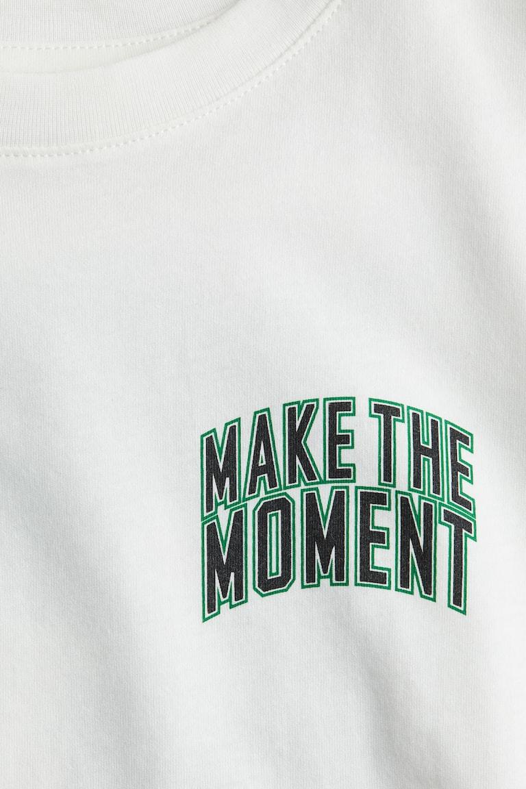 H&M T-Shirt mit Print Jubiläumsangebot